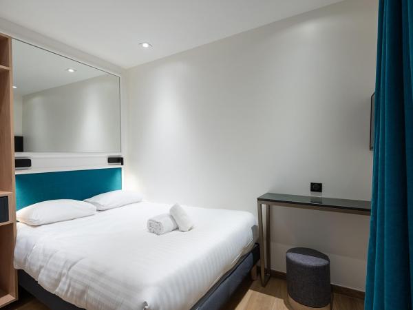 HOTEL AU COEUR DES ARTS ET METIERS : photo 3 de la chambre chambre double – vue sur cour