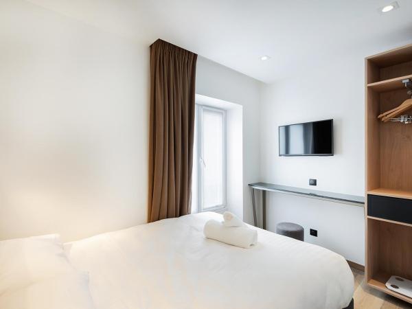HOTEL AU COEUR DES ARTS ET METIERS : photo 8 de la chambre chambre double – vue sur cour