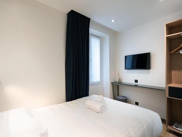 HOTEL AU COEUR DES ARTS ET METIERS : photo 9 de la chambre chambre double – vue sur cour