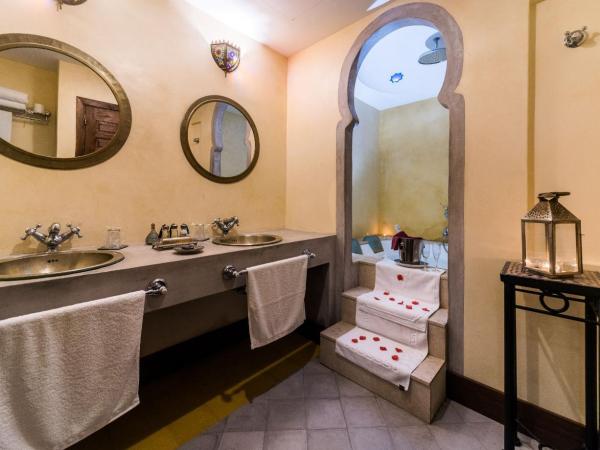 Alcoba del Rey de Sevilla : photo 9 de la chambre suite lit queen-size avec baignoire spa