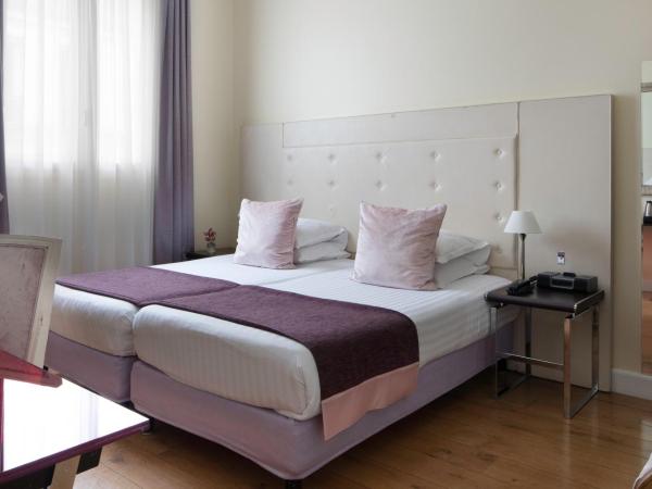 Le 123 Elysees - Astotel : photo 1 de la chambre chambre lits jumeaux standard