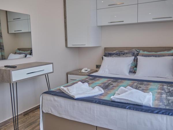 KALİSPERA HOTEL : photo 5 de la chambre chambre double avec salle de bains privative