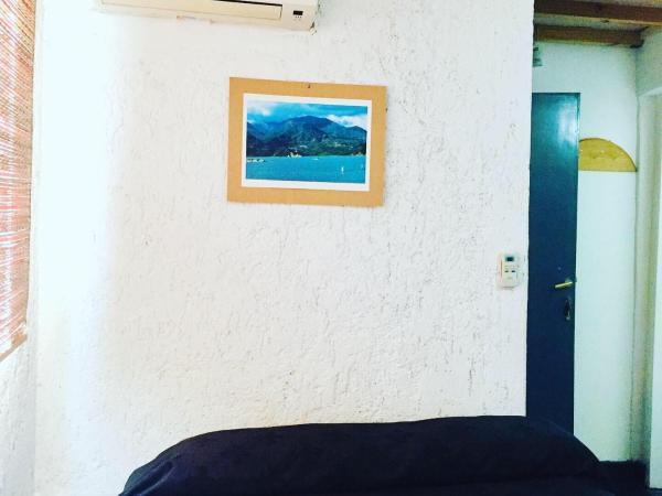 Hostel Otro Mundo : photo 1 de la chambre chambre familiale avec salle de bains privative