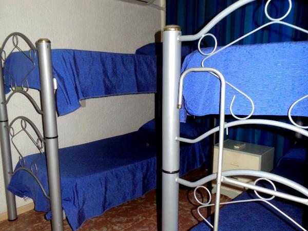 Hostel Otro Mundo : photo 1 de la chambre chambre triple basique avec salle de bains commune