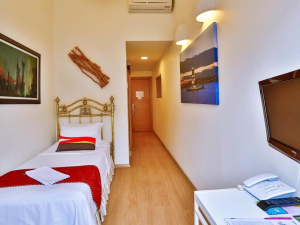 Han Hotel : photo 1 de la chambre chambre simple supérieure