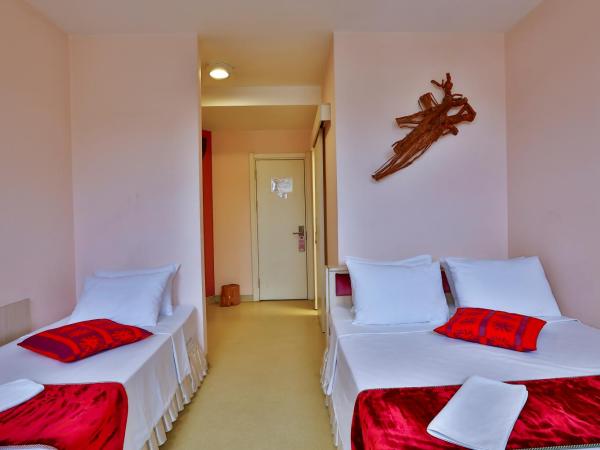 Han Hotel : photo 2 de la chambre chambre triple supérieure