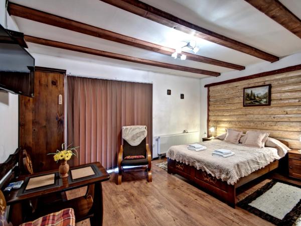 Magnat Inn & Sauna & Relax : photo 1 de la chambre chambre double avec balcon