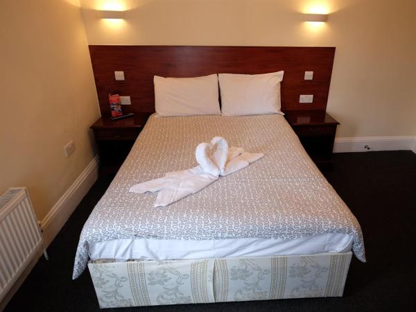 Charlotte Guest House : photo 1 de la chambre chambre double avec salle de bains commune