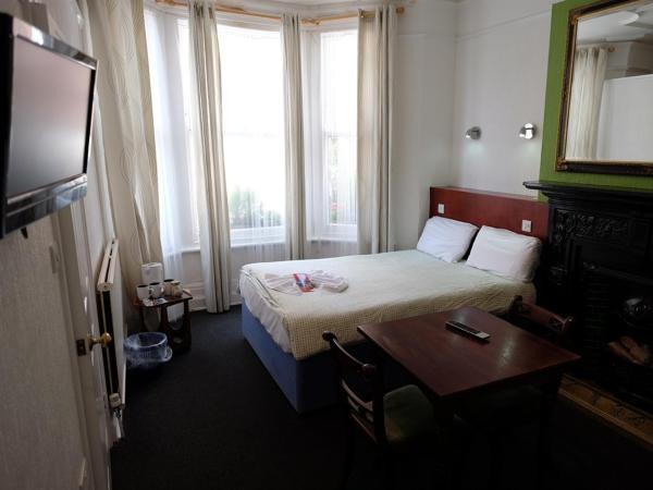 Charlotte Guest House : photo 3 de la chambre chambre triple