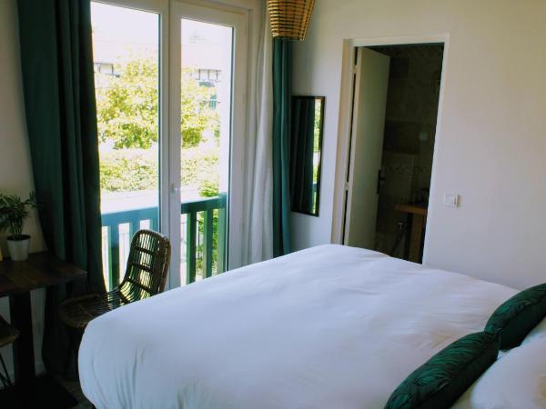 La Quintita Biarritz - studio avec jardin : photo 1 de la chambre chambre double ou lits jumeaux supérieure avec terrasse