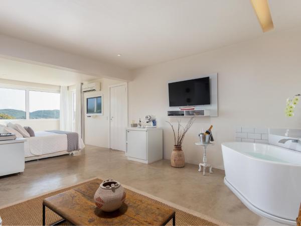 Abracadabra Pousada : photo 8 de la chambre loft suite with bathtub and sea view