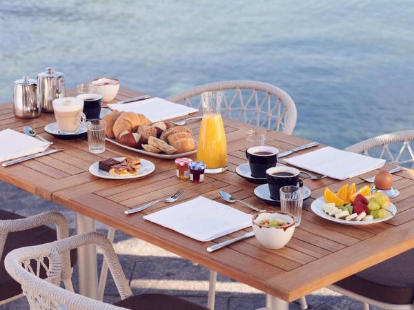 Vista Lakefront Boutique Hotel : photo 1 de la chambre chambre double lit king-size jardin