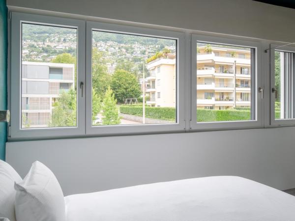 Riva Rooms & Studios - Check-In 24hr : photo 1 de la chambre chambre double ou lits jumeaux - vue sur montagnes