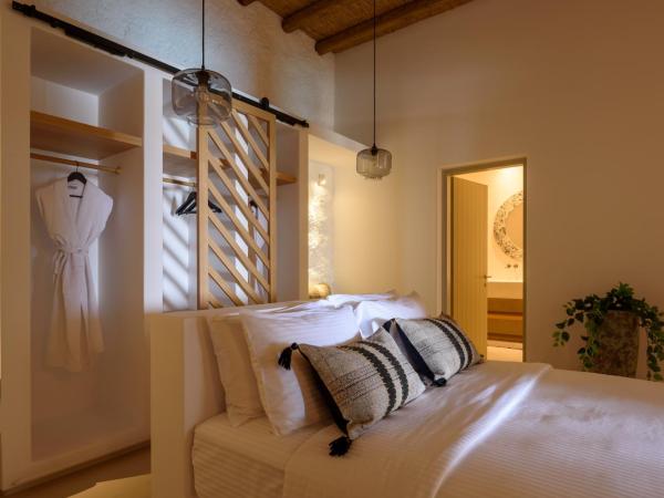 Este Luxury Suites : photo 3 de la chambre suite senior 2 chambres avec piscine troglodyte privée - vue sur mer