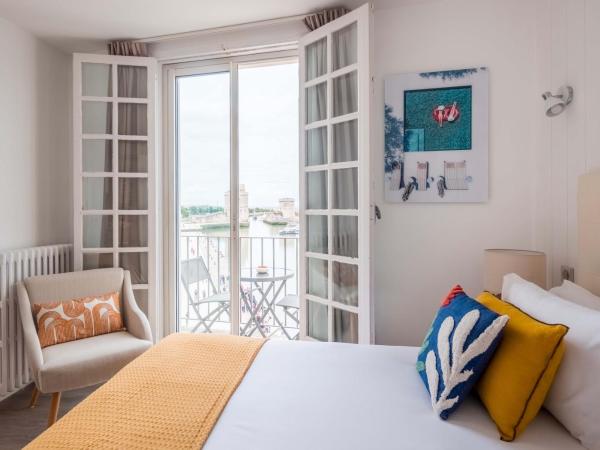 Tour de Nesle La Rochelle Vieux Port 3 etoiles : photo 4 de la chambre chambre lit king-size - vue sur mer
