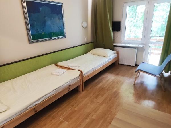 Strzeszynek - wypoczynek : photo 3 de la chambre chambre quadruple avec salle de bains