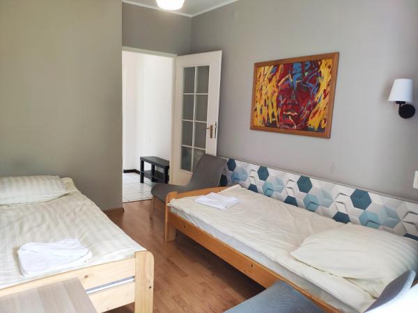 Strzeszynek - wypoczynek : photo 3 de la chambre chambre lits jumeaux