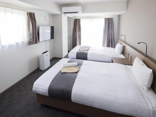 Coruscant Hotel NagasakiekiⅢ : photo 1 de la chambre chambre lits jumeaux standard