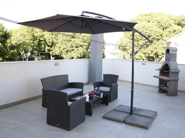Guest House Lorenta : photo 9 de la chambre studio avec terrasse