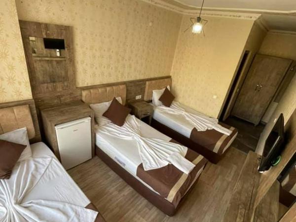 Özgür Hotel : photo 4 de la chambre chambre triple