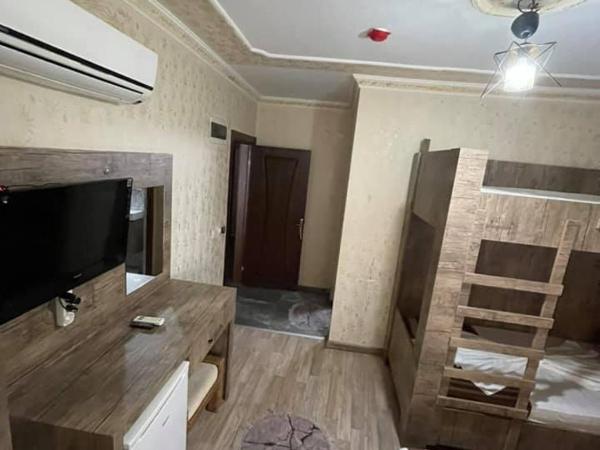 Özgür Hotel : photo 3 de la chambre chambre quadruple standard