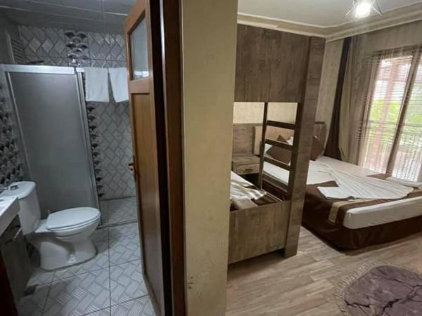 Özgür Hotel : photo 4 de la chambre chambre quadruple standard