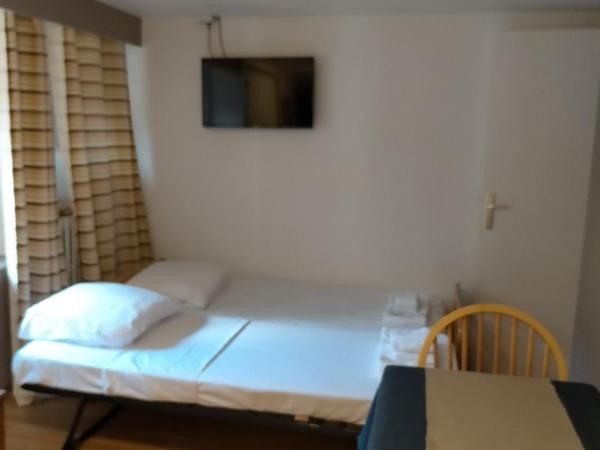 Hotel de Savoie : photo 5 de la chambre chambre quadruple avec vue sur cour
