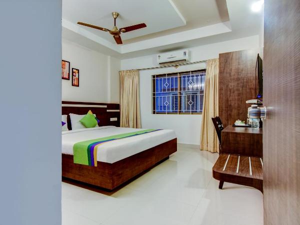 Treebo Primeland Suites : photo 6 de la chambre chambre double standard