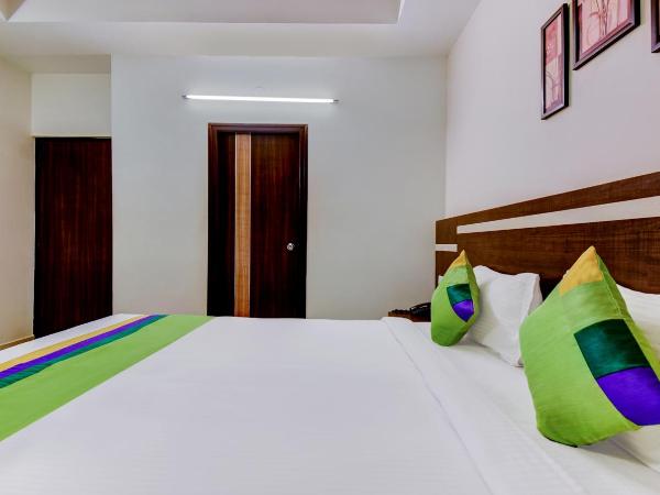 Treebo Primeland Suites : photo 5 de la chambre chambre double standard