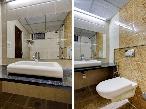 Treebo Primeland Suites : photo 2 de la chambre chambre double standard