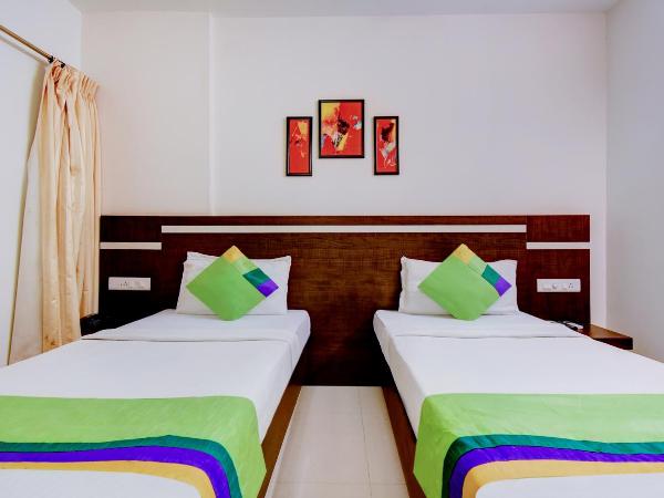 Treebo Primeland Suites : photo 10 de la chambre chambre double standard