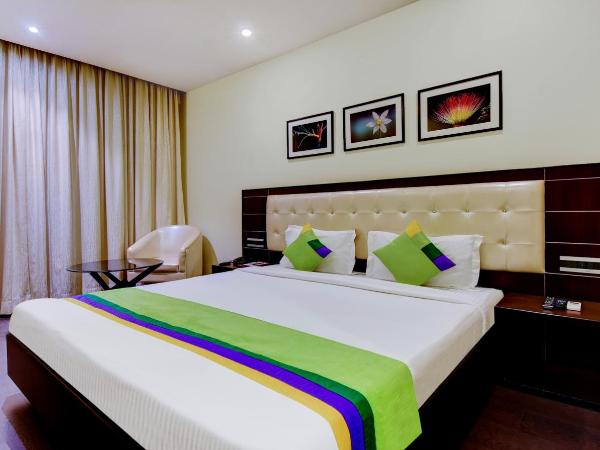 Treebo Primeland Suites : photo 5 de la chambre chambre double deluxe