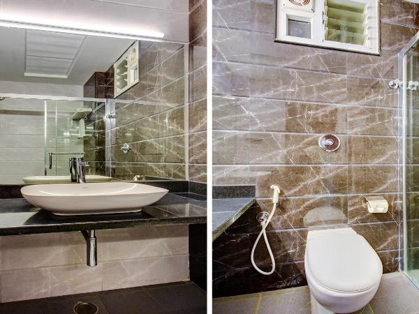 Treebo Primeland Suites : photo 9 de la chambre chambre double deluxe