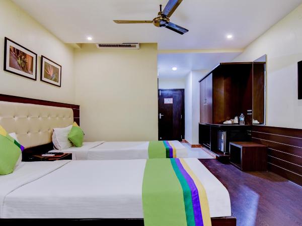 Treebo Primeland Suites : photo 8 de la chambre chambre double deluxe