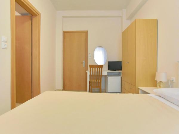 International Hotel : photo 1 de la chambre chambre lits jumeaux sans balcon - demi sous-sol