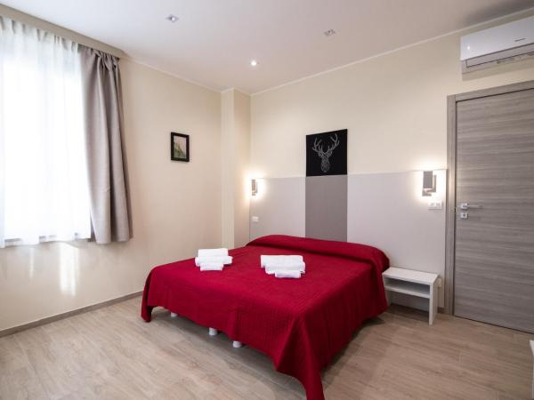 Le PALME : photo 3 de la chambre chambre deluxe double ou lits jumeaux