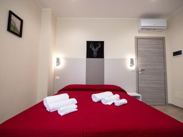 Le PALME : photo 1 de la chambre chambre deluxe double ou lits jumeaux