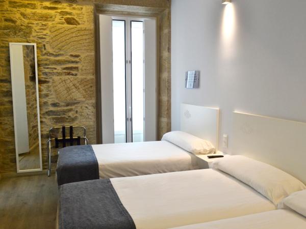 Hotel Alda San Bieito : photo 1 de la chambre chambre triple