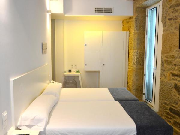 Hotel Alda San Bieito : photo 2 de la chambre chambre triple