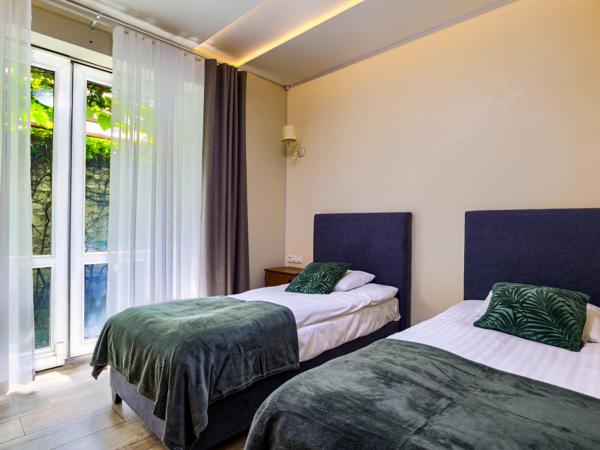 GRONO Apartamenty : photo 1 de la chambre chambre double standard