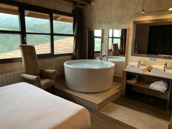 LA ALDEA SOÑADA : photo 5 de la chambre suite en duplex avec cuisine