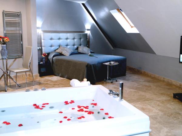 Caballero Errante : photo 1 de la chambre chambre lit queen-size avec baignoire spa