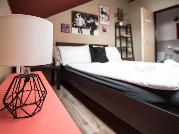 Brix Hostel : photo 1 de la chambre chambre quadruple avec salle de bains privative