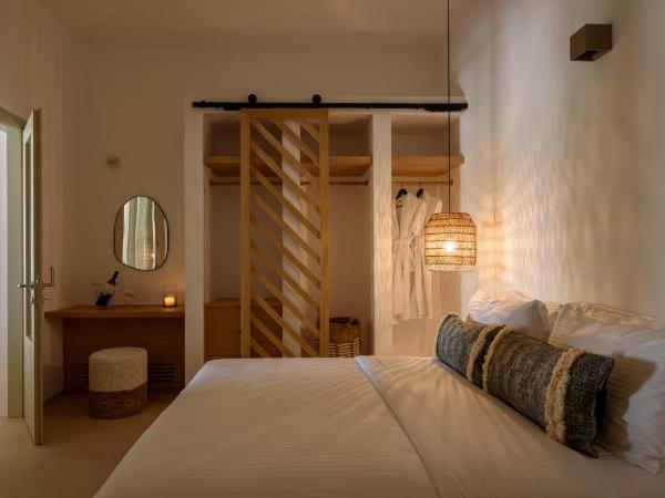 Este Luxury Suites : photo 7 de la chambre suite junior avec bain à remous - vue sur mer