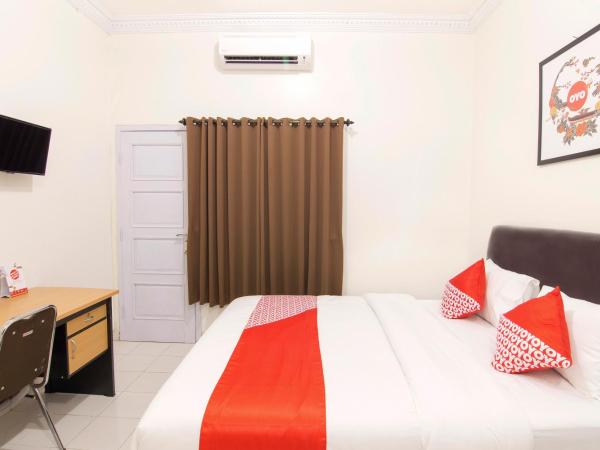 OYO Life 966 Dinda Guesthouse : photo 4 de la chambre chambre double standard