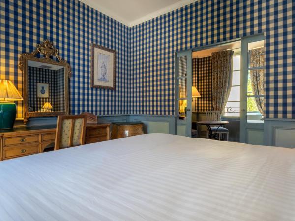 Café de Paris : photo 6 de la chambre suite - vue sur ville