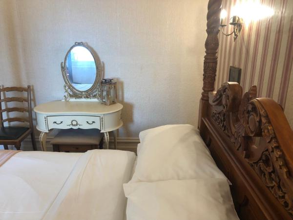 Cherry Blossom Inn : photo 3 de la chambre chambre double