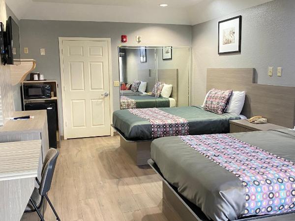 Island Suites Hobby Airport : photo 5 de la chambre suite avec 2 lits queen-size