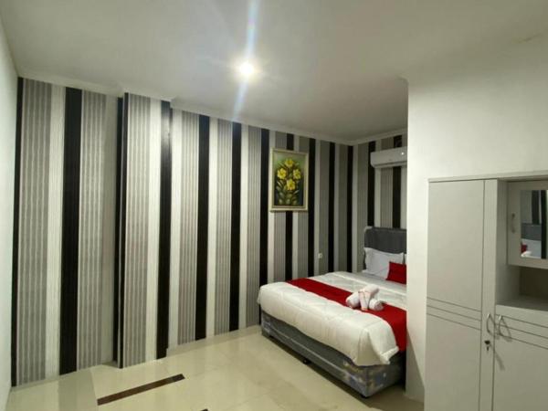 RedDoorz Plus @ Rawamangun : photo 2 de la chambre chambre deluxe