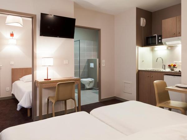 Nehô Suites Porte de Genève - Gare Annemasse : photo 1 de la chambre chambre triple